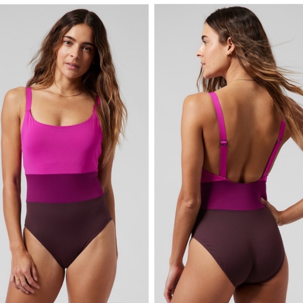 Athleta swimsuit. New without tags. Size med petite. Flattering colorblock